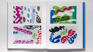 Book spread with abstract artworks featuring colorful squiggles