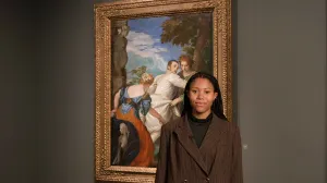 video still of woman standing in front of painting in Frick Madison gallery