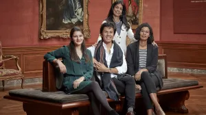 Trustee Ayesha Bulchandani with three former interns in the East Gallery