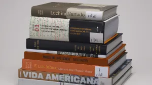 Horizontal stack of 8 library books on Hispanic American art history