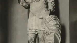 Marble statue of King Louis XII of France in military garb with his right hand raised