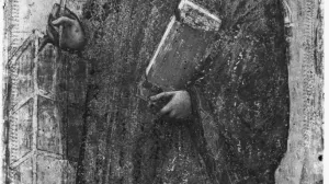 Standing young male saint in a panel holding a cross and a book and facing left.
