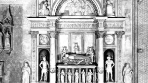 Black and white photograph of a monumental wall tomb