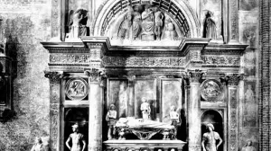 A black-and-white photograph of a Renaissance wall tomb set in a Venetian church.