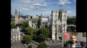 video still of photo of Westminster Abbey with Xavier Salomon lecturing corner window