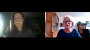 video still of two speakers on webinar