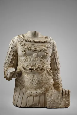 Marble torso of a statue featuring a breastplate with intricate relief carvings