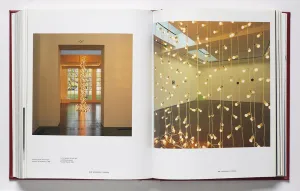 Book spread featuring images of an art installation with groups of string lights