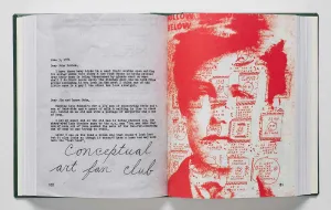 Book spread featuring a sketches over a boy's face in red, a typewritten letter, and the handwritten words 