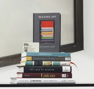 Stack of books with a library card