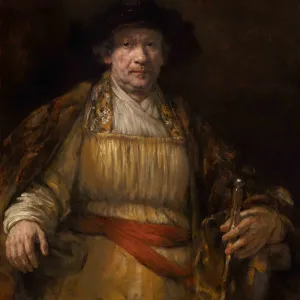 sitting man wearing yellow and arms on armrest