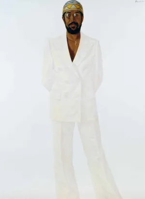 Portrait of a man in a white suit wearing a colorful cap and glasses against a white background.