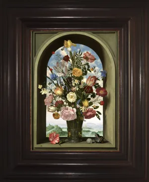 Photograph of a computer monitor featuring a digital image of a floral bouquet in a vase; framed