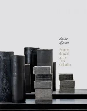 book cover with dark sculptures on white background