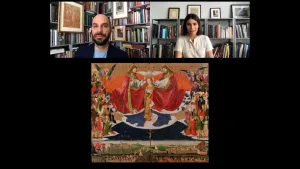 video still of Xavier Salomon and Emma Capron speaking over painting