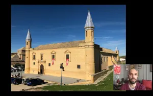 video still of Xavier Salomon and building