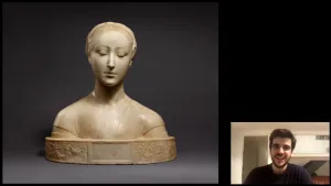 video still of Giulio Dalvit and marble bust of woman