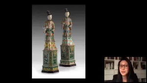 video still of Aimee Ng and two porcelain female figures